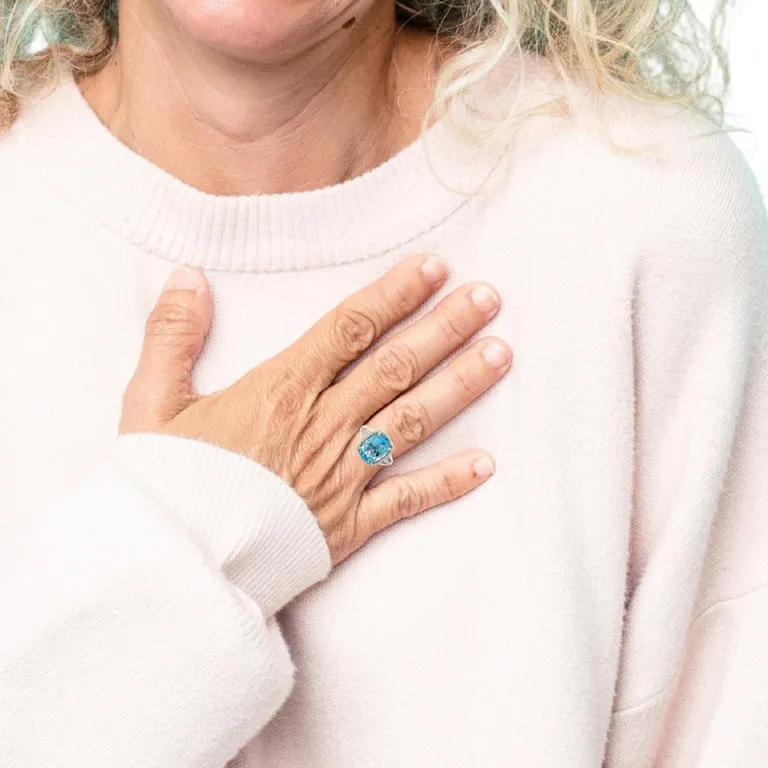 8.59 Carat Blue Topaz and Diamond Halo Cocktail Ring in White and Yellow Gold