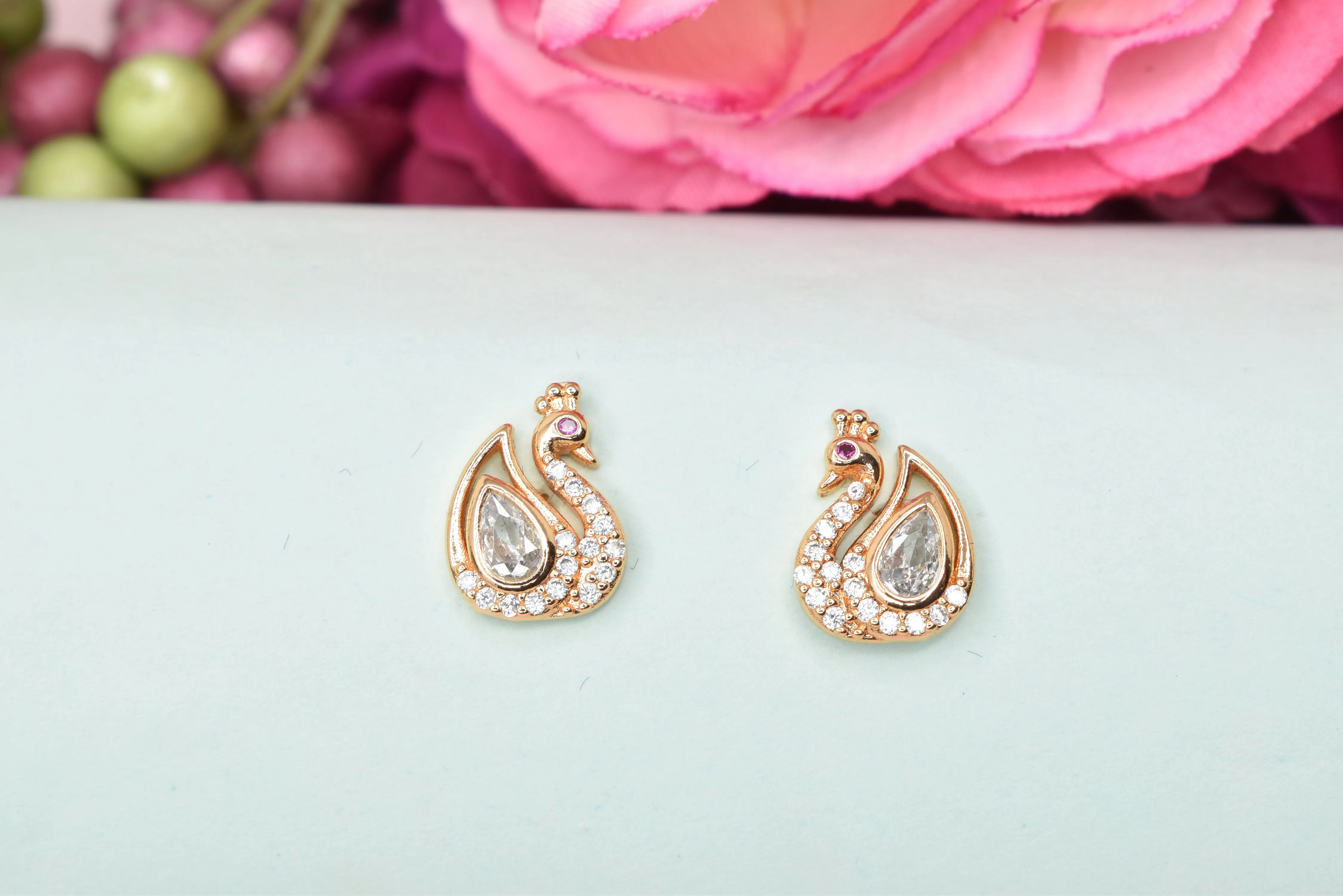Elegant Rose Gold Studs: Versatile Feminine Sparkle