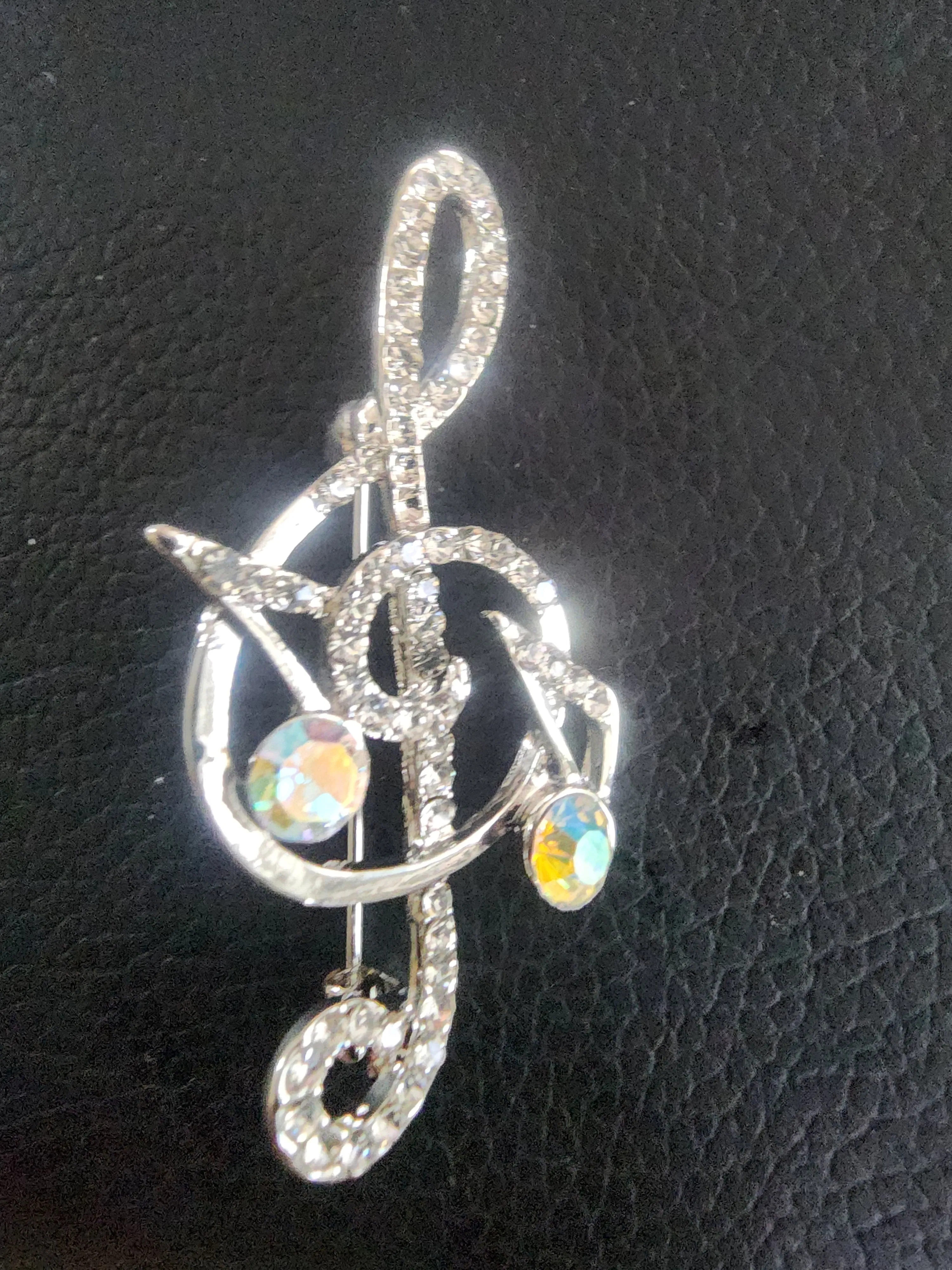 Sparkling Musical Elegance: Rhinestone Treble Clef Brooch